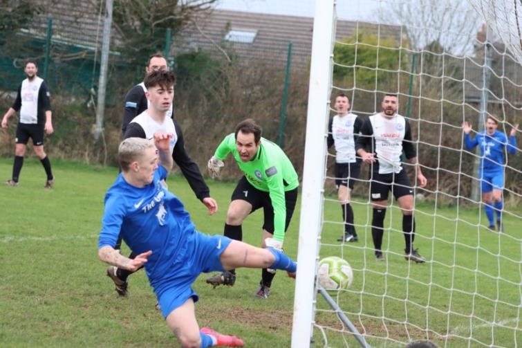 Will Haworth scores at far post for Wizards. Picture Matthew Watters Photography